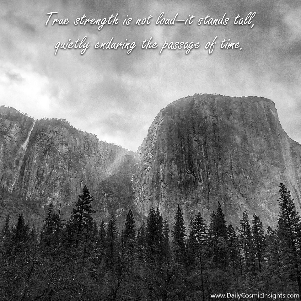 A mountain looms over a forest in this black and white photograph. The text reads, "True strength is not loud—it stands tall, quietly enduring the passage of time."